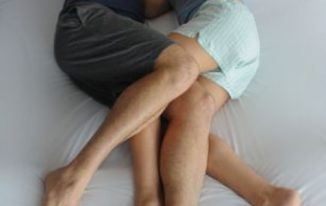 the-leg-hug sleep positions