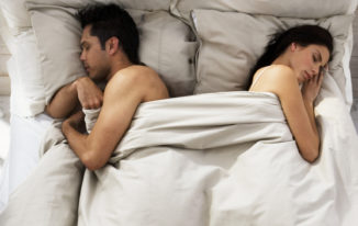 Couple Sleeping on Opposite Sides of Bed sleep positions